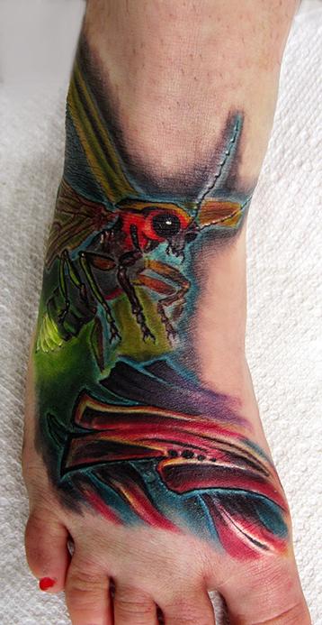Lightning bug bio abstract foot by Sorin Gabor : Tattoos